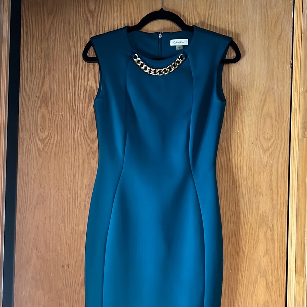 Calvin Klein blue dress with gold accent